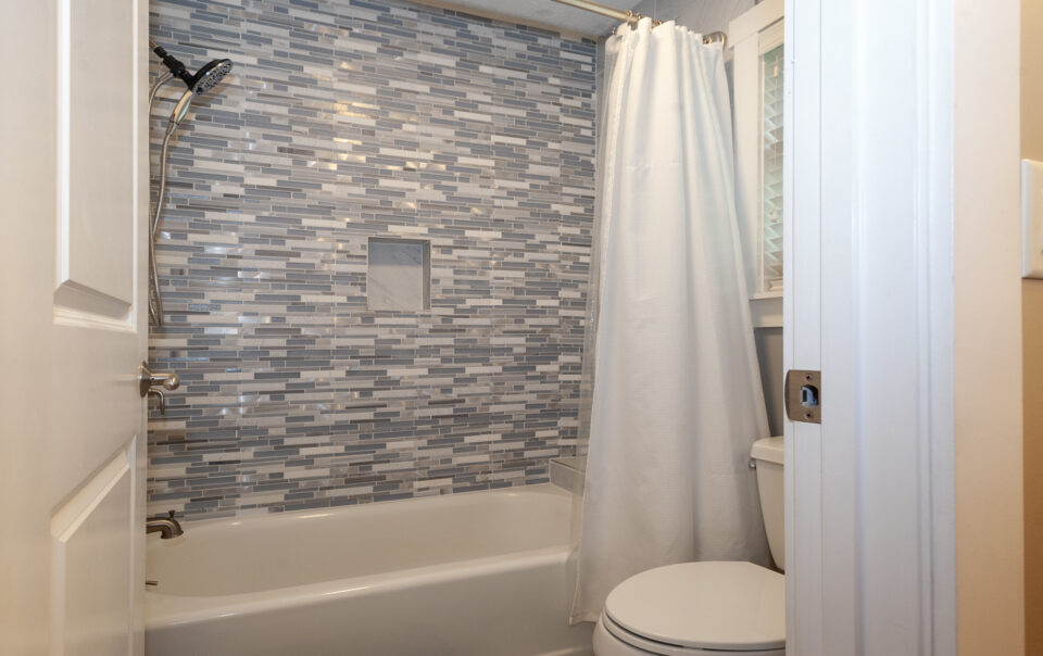 Modern bathroom with stylish tile accents.
