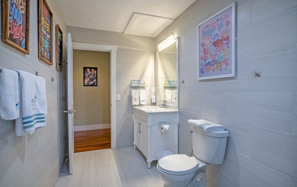 Bright bathroom with modern fixtures and decor.