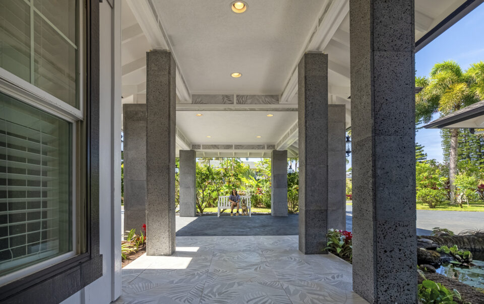 Spacious entryway with tropical landscaping views.
